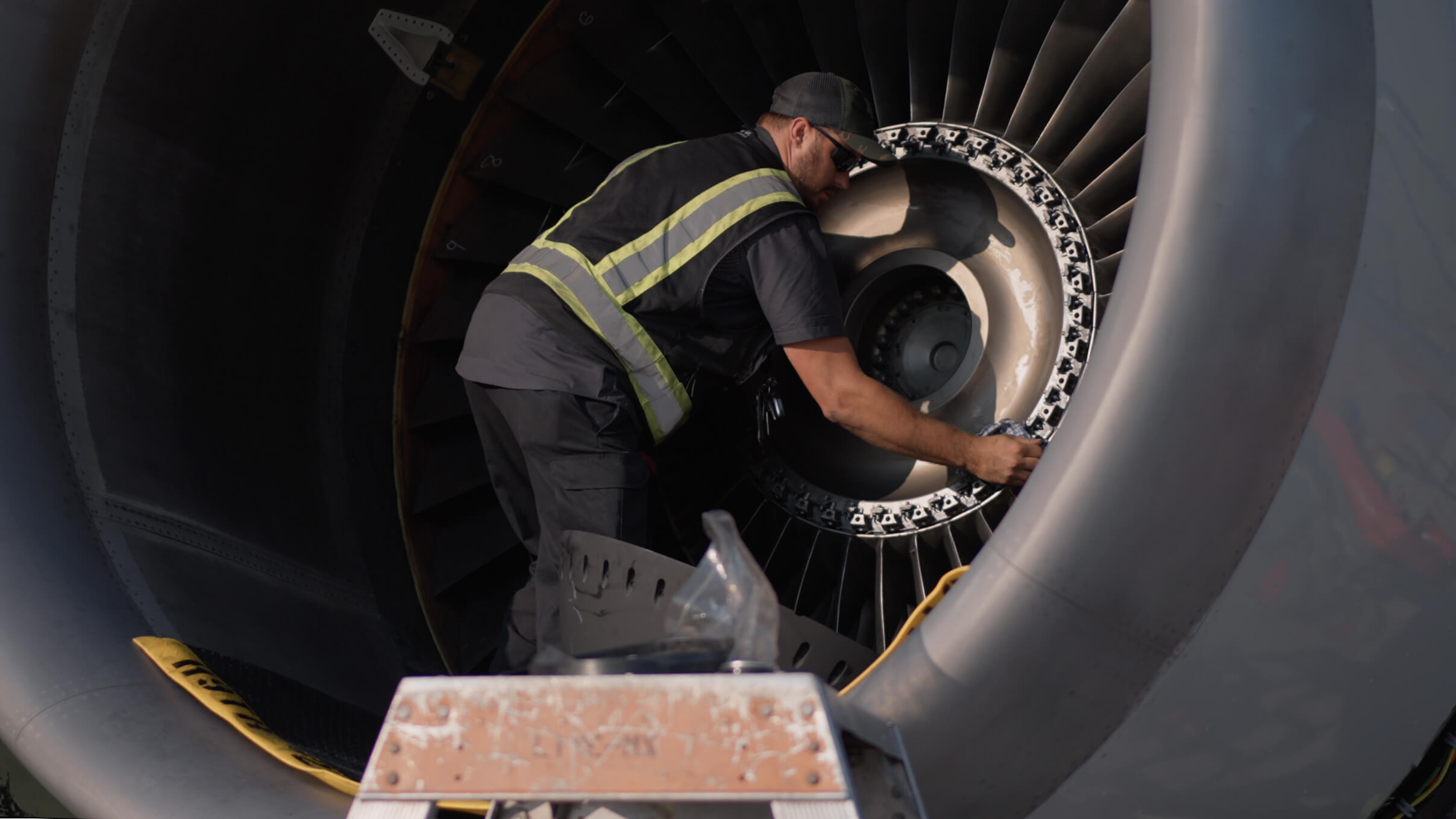 Kalitta Air maintenance personnel working on an engine