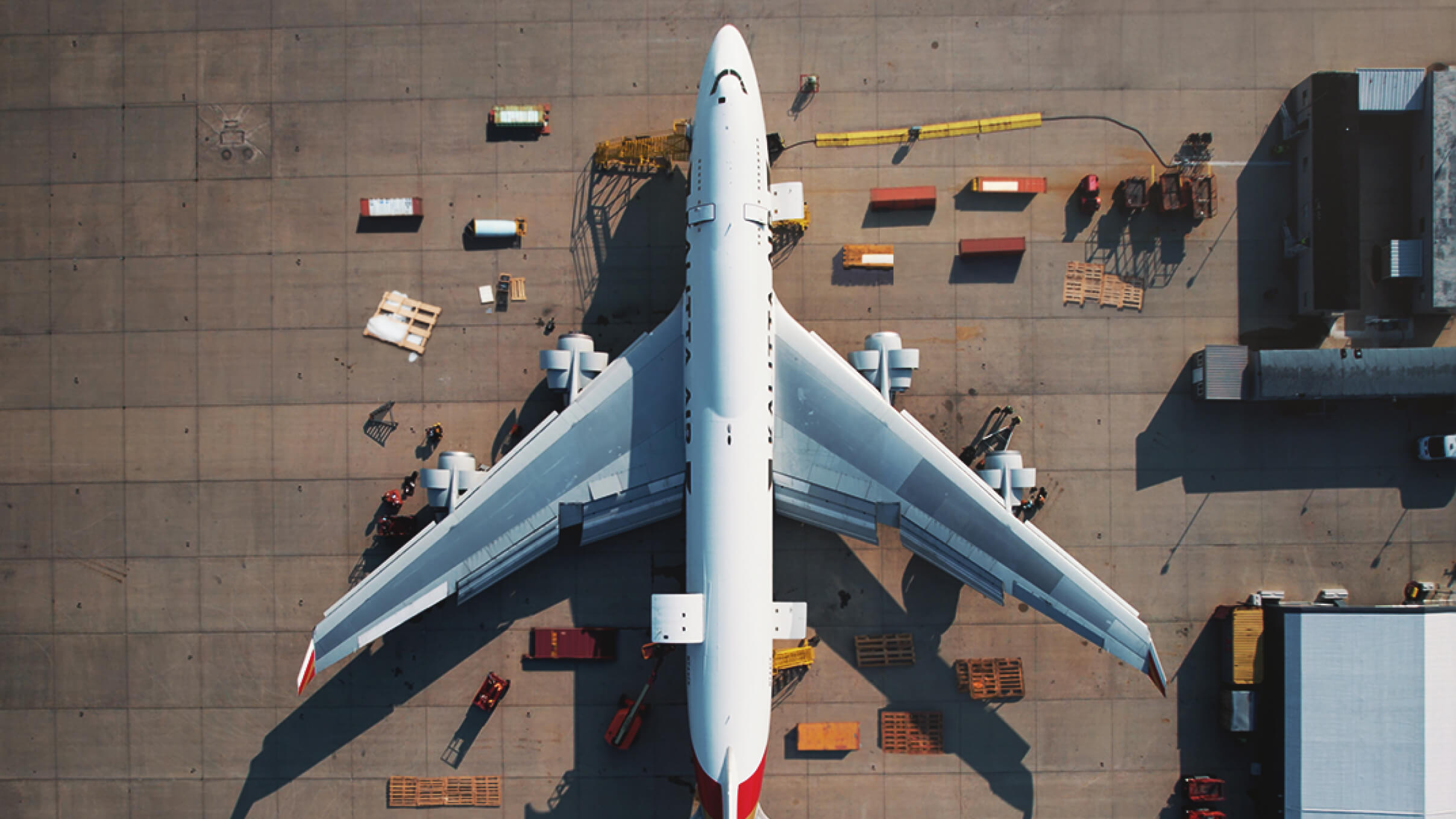 Overhead view of Kalitta Air plane with cargo on tarmac