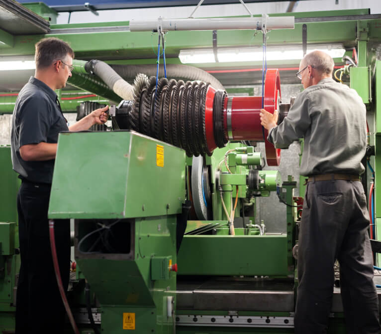 Kalita Air employees working on equipment
