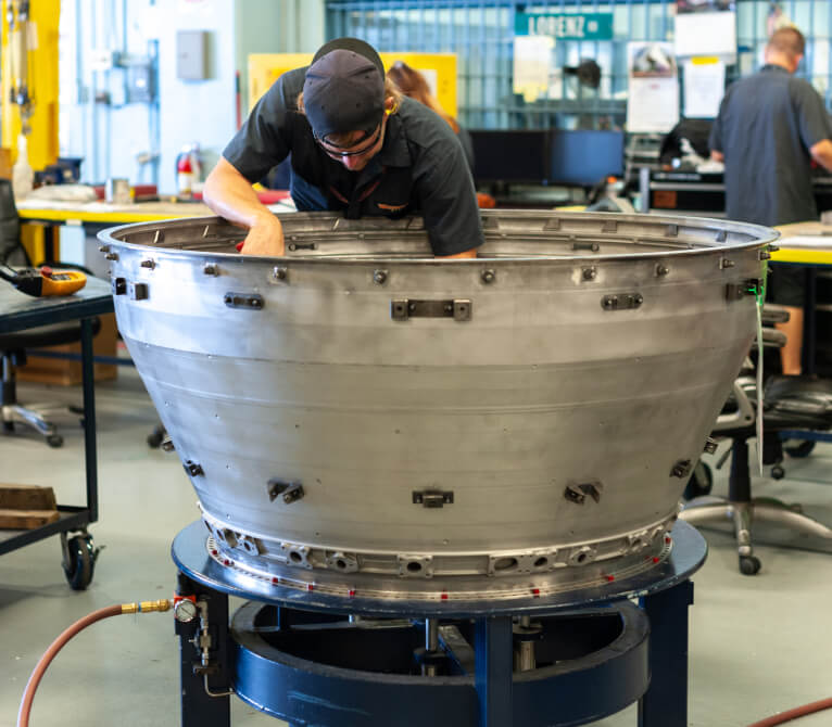 Kalitta Air employee working on an engine