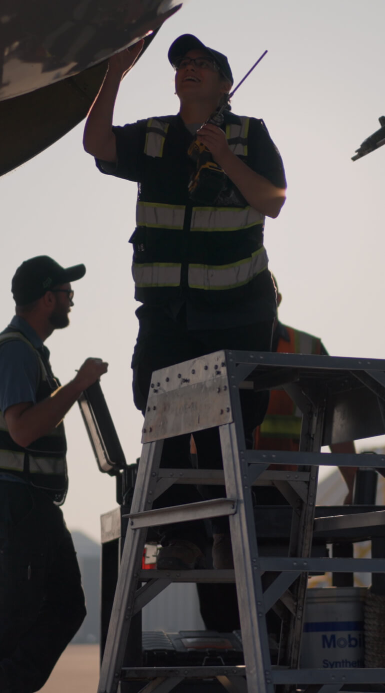 Kalitta Air maintenance technicians working together.